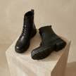 FJØRNA men's leather combat boots with side zipper, orthopedic design, showcasing sturdy construction and stylish ankle fit.