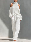 FJØRNA women's linen summer two-piece co-ord set featuring a flowy, lightweight top and matching shorts in soft neutral tones.