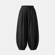 FJØRNA linen blend harem trousers for women with elastic waist, relaxed fit and comfortable, flowing design.