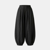 FJØRNA linen blend harem trousers for women with elastic waist, relaxed fit and comfortable, flowing design.