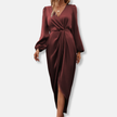 FJØRNA elegant midi dress for women with V-neck and long sleeves, featuring a stylish and sophisticated design.