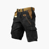 Men's FJØRNA cargo shorts with multiple functional pockets and ample storage, made of durable fabric for outdoor activities.