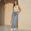 Women’s FJØRNA high waist bootcut jeans with slim fit, displayed on a model showing the full length and classic denim style.