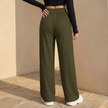 FJØRNA women's wide leg trousers with elastic waist and pleated design, featuring a relaxed fit and lightweight fabric.