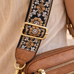 FJØRNA leather shoulder bag for women, stylish black bag with adjustable strap and spacious interior, perfect for everyday use.