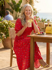 FJØRNA women's summer midi dress with floral print, square neckline, puff sleeves, perfect for warm weather.