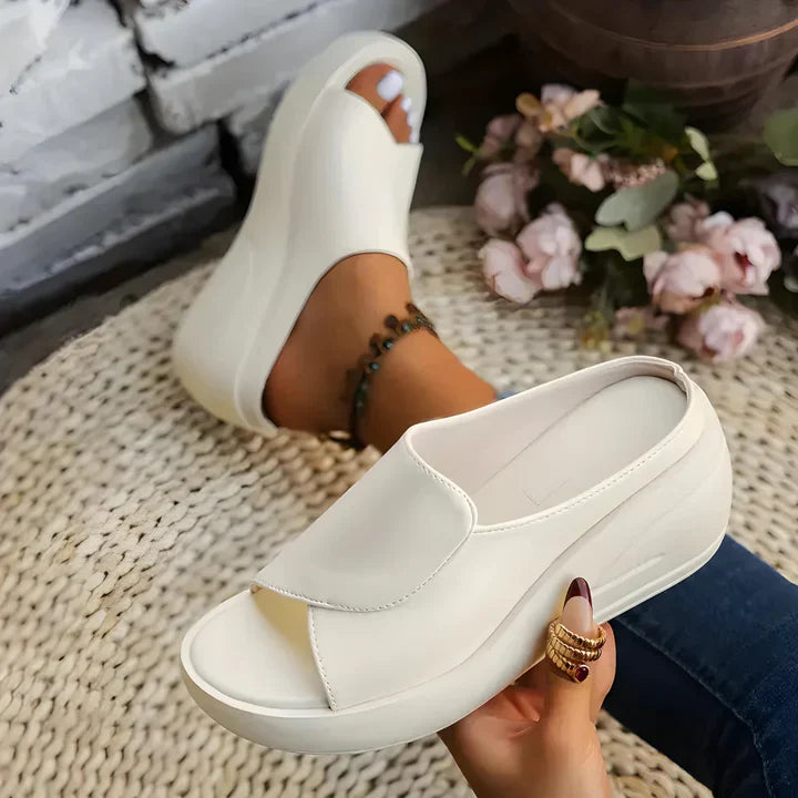 FJØRNA Eliza™ orthopedic slip-on wedge sandals with cushioned footbed and adjustable straps, showcasing their stylish design.