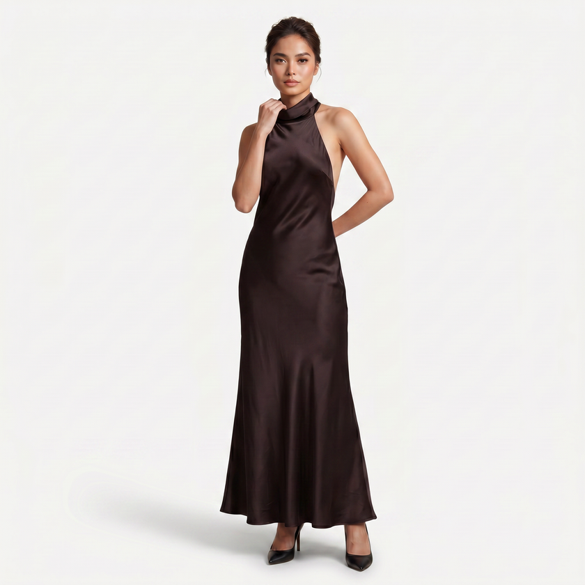 Women's satin halter maxi dress by FJØRNA featuring an open back and cowl neck, suitable for formal evening occasions.