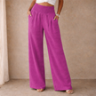 FJØRNA women's linen blend wide leg trousers with elastic waist and relaxed fit, shown in a natural beige color.
