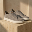FJØRNA men's suede trainers, stylish casual shoes with tan suede uppers and white rubber soles, suitable for everyday wear.