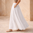 FJØRNA women's high waist maxi skirt, flowing fabric, full length, stylish and comfortable for casual or dressy wear.
