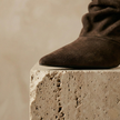 FJØRNA suede ankle boots for women, stylish shoes with a sleek design, featuring a rounded toe and low block heel.