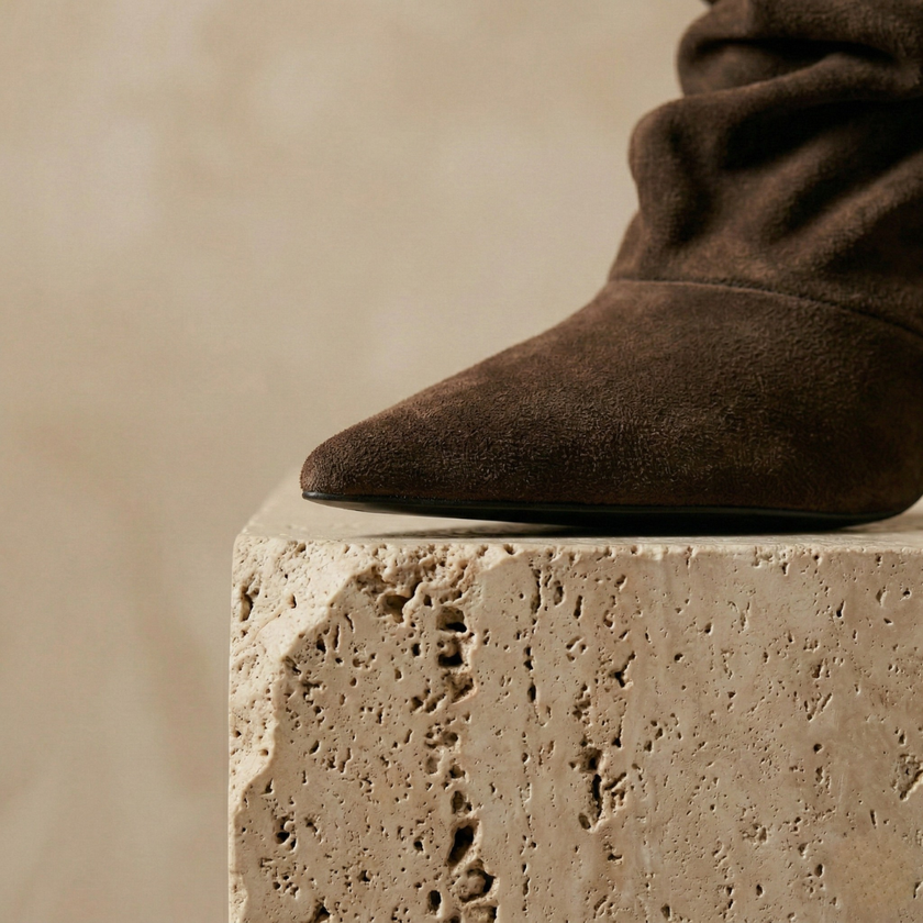 FJØRNA suede ankle boots for women, stylish shoes with a sleek design, featuring a rounded toe and low block heel.