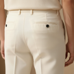 FJØRNA men's straight leg trousers with a relaxed fit, casual pants shown in a neutral color on a model.