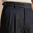 FJØRNA men's high waist straight leg trousers showing a tailored fit and classic design in neutral fabric.