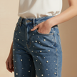 Relaxed fit baggy denim jeans for women by FJØRNA, showing the casual, comfortable style and classic blue denim fabric.