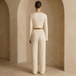 Women’s soft knit lounge co-ord set by FJØRNA, featuring a cozy matching top and pants in a relaxed fit.