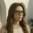 FJØRNA unisex retro aviator sunglasses with metal frames and dark tinted lenses, stylish accessory for men and women.