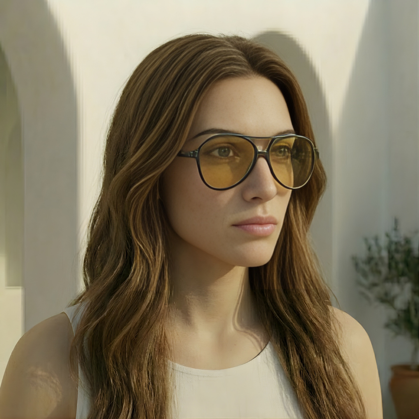 FJØRNA unisex retro aviator sunglasses with metal frames and dark tinted lenses, stylish accessory for men and women.