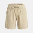 Men's relaxed fit drawstring shorts by FJØRNA, featuring casual style and comfortable fabric, shown on a model.
