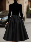Elegant black velvet and satin midi dress for women by FJØRNA, featuring a sleek design and sophisticated fit.