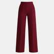 High waist FJØRNA women's wide leg tailored trousers, showcasing their relaxed fit and sleek design in natural fabric.