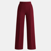 High waist FJØRNA women's wide leg tailored trousers, showcasing their relaxed fit and sleek design in natural fabric.