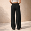 FJØRNA women's lounge trousers with drawstring waist and relaxed fit, comfortable casual pants for everyday wear.