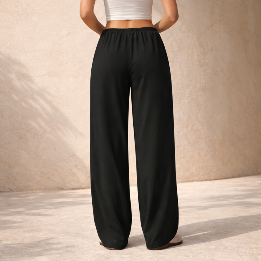 FJØRNA women's lounge trousers with drawstring waist and relaxed fit, comfortable casual pants for everyday wear.