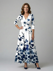 FJØRNA women's floral summer maxi dress with long sleeves, wrap style, flowy fabric, perfect for warm weather.