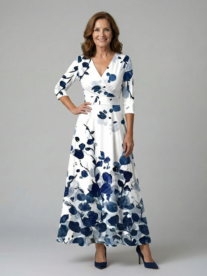 FJØRNA women's floral summer maxi dress with long sleeves, wrap style, flowy fabric, perfect for warm weather.