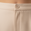 FJØRNA women's straight leg trousers in neutral fabric, featuring a classic fit and tailored design for a sleek, stylish look.