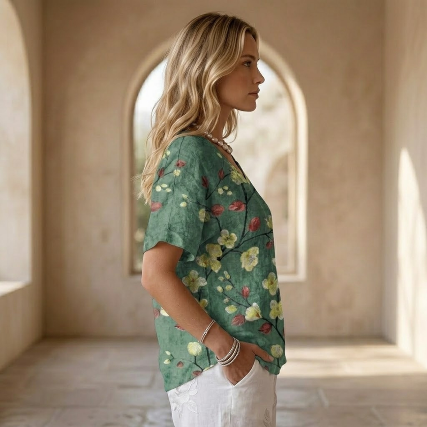 FJØRNA men's top, casual long-sleeve shirt with a relaxed fit, in dark color, displayed flat on a white background.