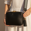 FJØRNA leather chevron strap genuine crossbody bag for women with stylish design and adjustable strap, made from high-quality leather.