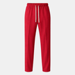 FJØRNA men's wide leg joggers with drawstring waist, made of comfortable fabric, shown in a casual style.