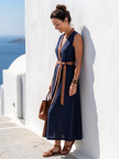 FJØRNA elegant sleeveless midi wrap dress for women, showcasing a fitted waist and flowing skirt in a stylish design.