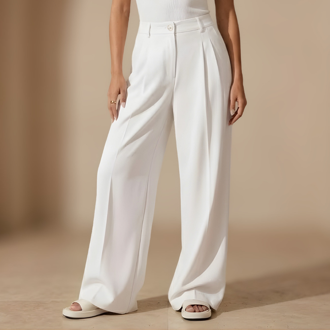 FJØRNA women's high waist wide leg tailored trousers, showing the fit and fabric details of the stylish pants.