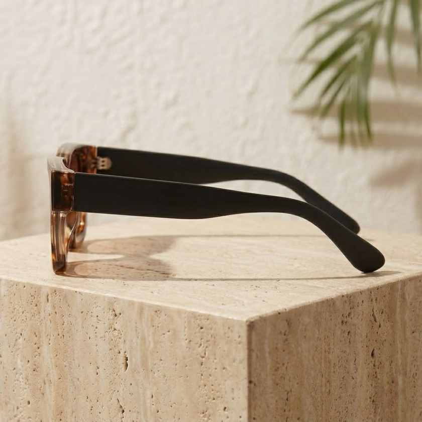 FJØRNA vintage rectangular unisex sunglasses with dark tinted lenses and black frame, stylish accessory for women and men.