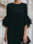 FJØRNA black dress with ruffled sheer sleeves, elegant sleeveless evening dress with flowy fabric and stylish design.