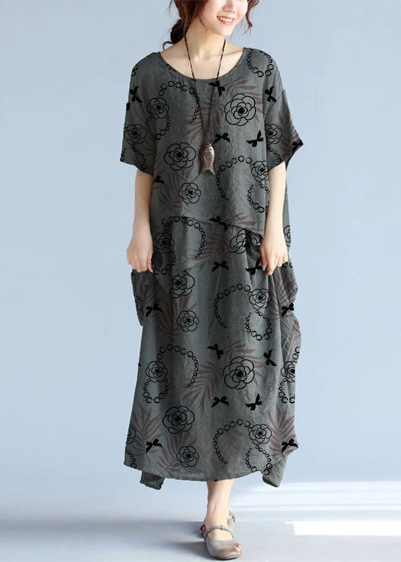 Gray linen cotton maxi dress by FJØRNA featuring a casual wedding dress style, with flowing fabric and relaxed fit.