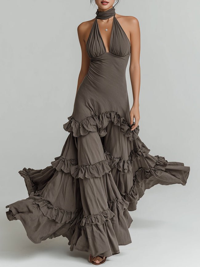 FJØRNA bohemian style halter neck ruffled maxi dress with flowing fabric and floral patterns, perfect for summer occasions