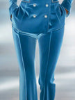 Blue loose velvet flared trousers for women by FJØRNA, featuring wide legs and soft, luxurious fabric.
