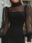 Black sheer puff sleeve mini dress by FJØRNA featuring structured design and leather accents, perfect for chic evening wear.