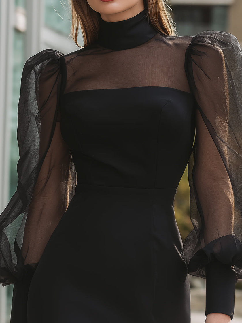 Black sheer puff sleeve mini dress by FJØRNA featuring structured design and leather accents, perfect for chic evening wear.