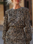 FJØRNA leopard print long-sleeve tailored mini dress displayed on a model, showcasing stylish and fitted design.