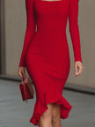 FJØRNA red square-neck puff-sleeve bodycon midi dress displayed on a model, highlighting its fitted silhouette and stylish design.