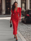 FJØRNA elegant red satin midi dress with polka dot pattern, featuring a fitted waist and flowing hem for a stylish look.