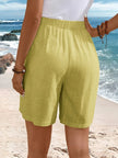 FJØRNA lightweight summer shorts for women with relaxed fit, elastic waistband, and breathable fabric, ideal for warm weather.