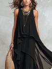 FJØRNA bohemian black layered chiffon maxi dress featuring flowing fabric and layered design, perfect for elegant summer occasions.