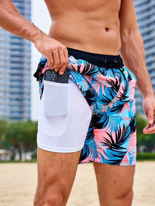 Men's FJØRNA secure fit swim shorts for the beach, featuring quick-dry fabric and adjustable waistband for comfortable swimwear.